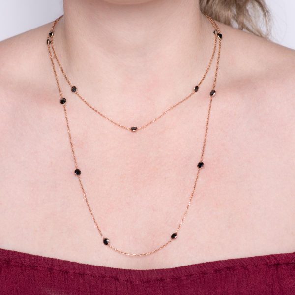 silver long necklace with black zirconia stones