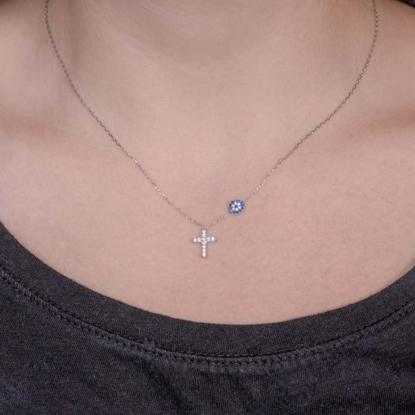 silver necklace evil eye and cross
